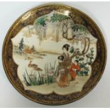 A Japanese Satsuma porcelain plaque, diam. 19.5cm.