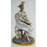 A late 19th century porcelain figure, height20cm. Condition - various damage.