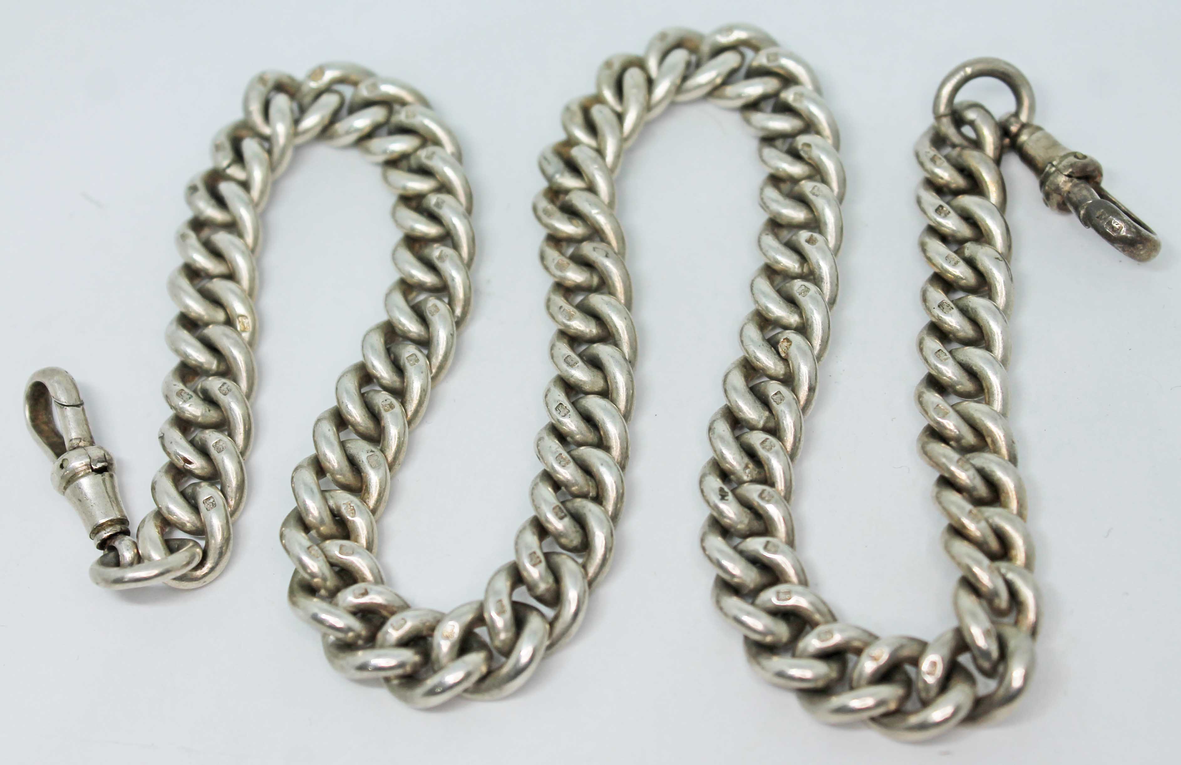 A hallmarked silver chain, length 41cm, wt. 86.3g.