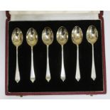 A cased set of six British hallmarks silver tea spoons, various essay marks 1958.