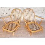 A pair of Ercol Blonde elm and beech Windsor armchairs. Condition - good, generally wear to