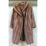 A vintage half length brown mink fur coat with hat, size 8 UK. The fur coat is in good condition, no
