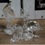 A group of three Swarovski ornaments including two Inspiration Africa figures Kudu and Lion,