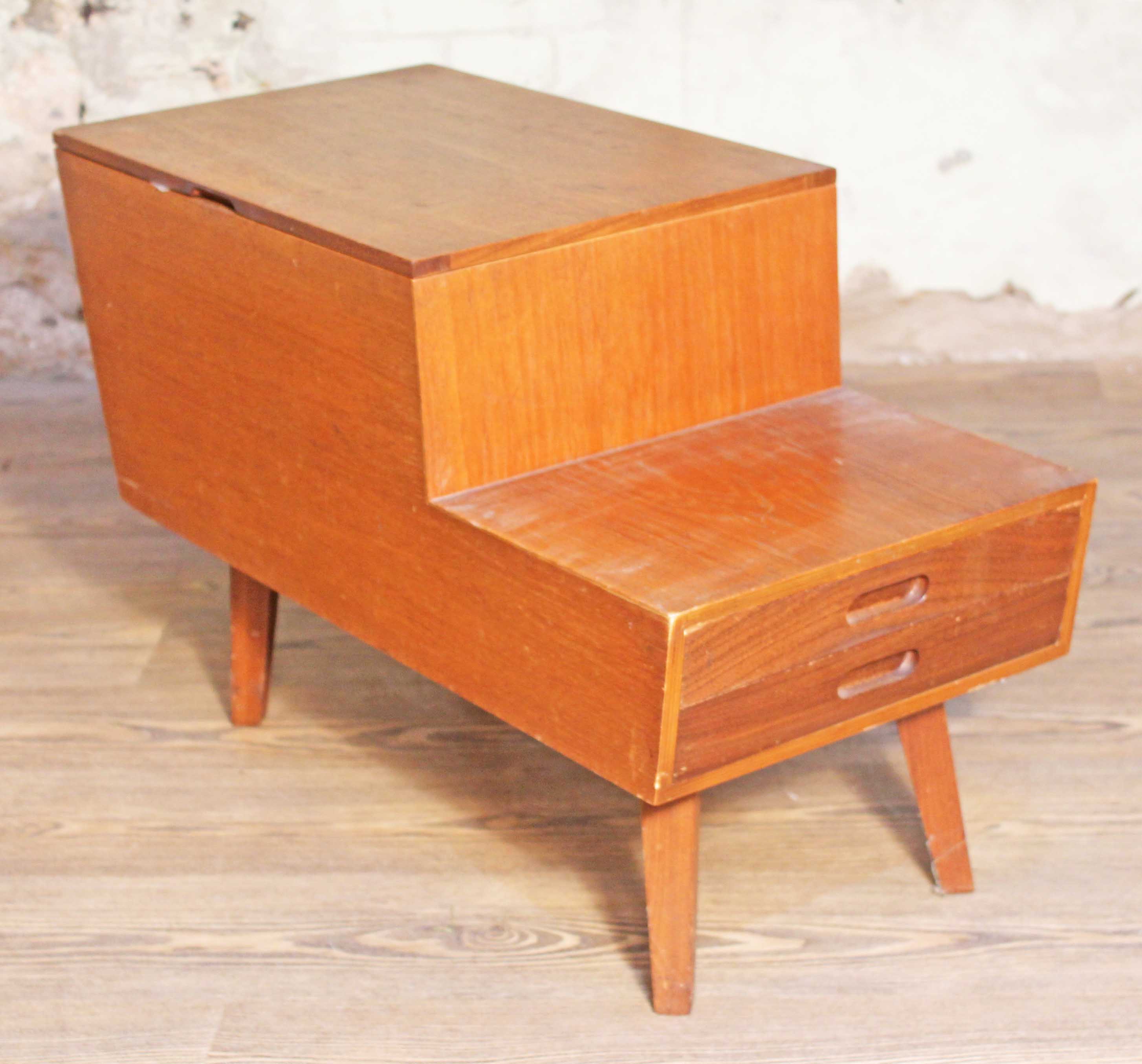 A Vanson teak sewing box with lift top , two drawers and square tapered legs, length 74cm, depth