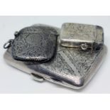 Hallmarked silver comprising a cigarette case and two vestas, gross wt. 3oz.