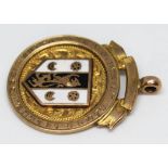 A hallmarked 9ct gold enamel games medal, gross wt. 6.7g.