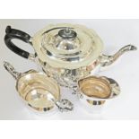 A three piece hallmarked silver tea set, gross wt. 17oz.