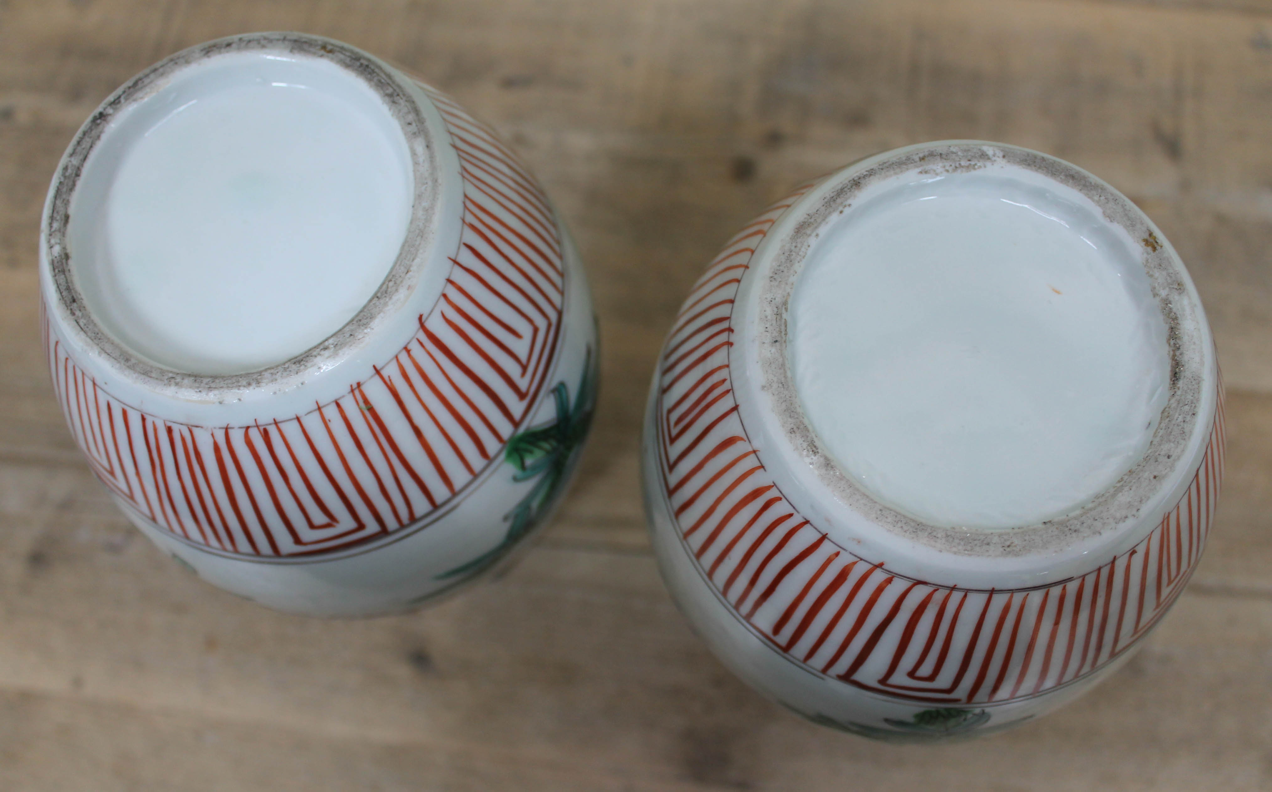A pair of Japanese Arita porcelain bottle vases, height 30.5cm. Condition - one having crazed line - Image 2 of 3