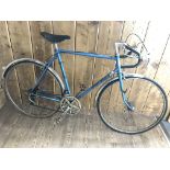 A vintage Falcon British Eagle 57cm road touring bicycle with mixed vintage components including
