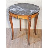 A French occasional table with marble top and gilt metal mounts, diam. 70cm & height 78cm.