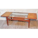 A G-Plan teak and glass top coffee table.