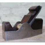 A Norris steel smoothing plane with rose wedge and infill, 6 3/4", stamped 'Norris London', cast