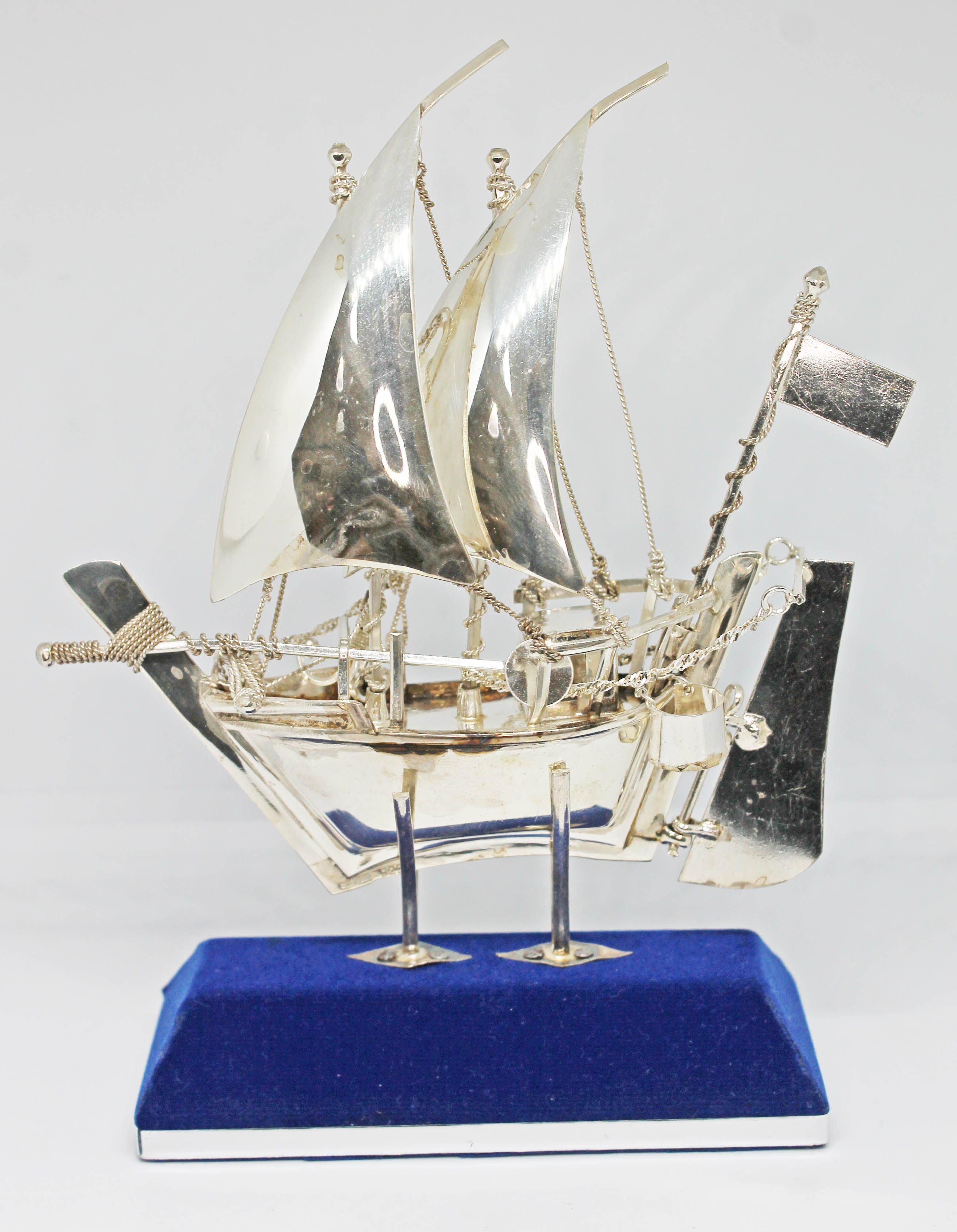 A model sailing ship on stand, marked 'Silver 925', height 15cm, wt. 3oz.
