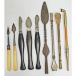 A mixed lot comprising surgical knives, a spear head, two metal drinking straws and a Chinese bamboo