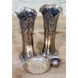 A mixed lot of hallmarked silver comprising a pair of vases, a dish and a salt.