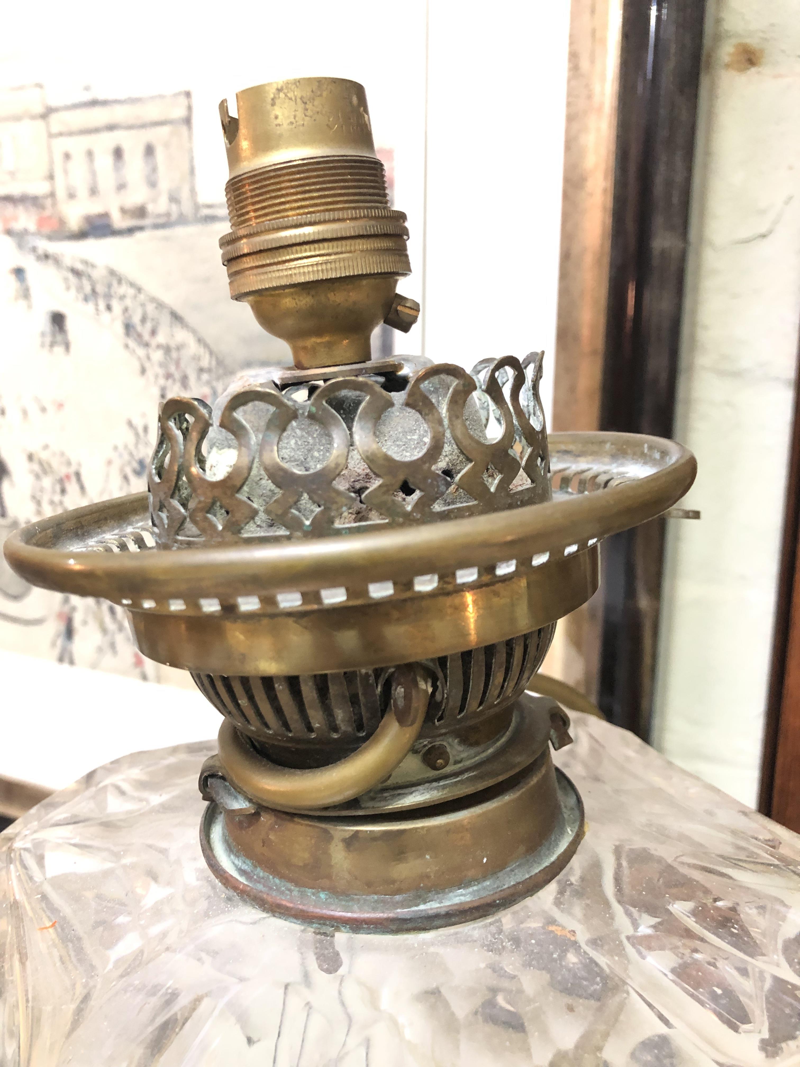 A Victorian brass lamp with cut glass reservoir, single column with acanthus mouldings and ionic - Image 4 of 5