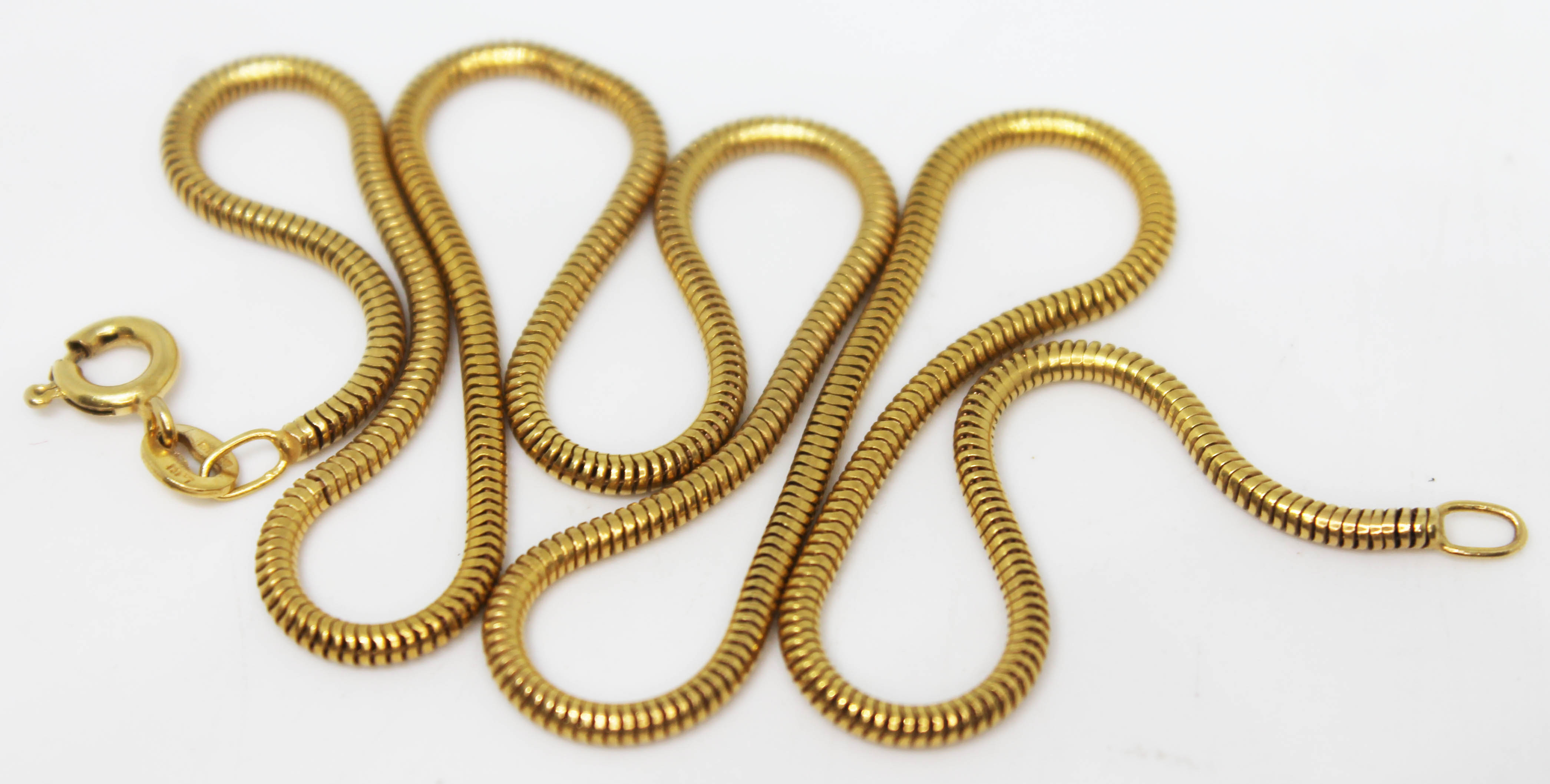 A 9ct gold tube link chain, import marks, length 40cm, wt. 7.4g.