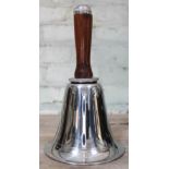 An Art Deco silver plated cocktail shaker in the form of a bell with wooden handle, height 27cm.