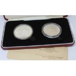 A cased set of two Moogolian silver proof coins, 25 & 50 totpot, Royal Mint, boxed with