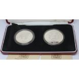 A cased set of two Venezuela silver proof coins, 25 & 50 bolivares, Royal Mint, boxed with