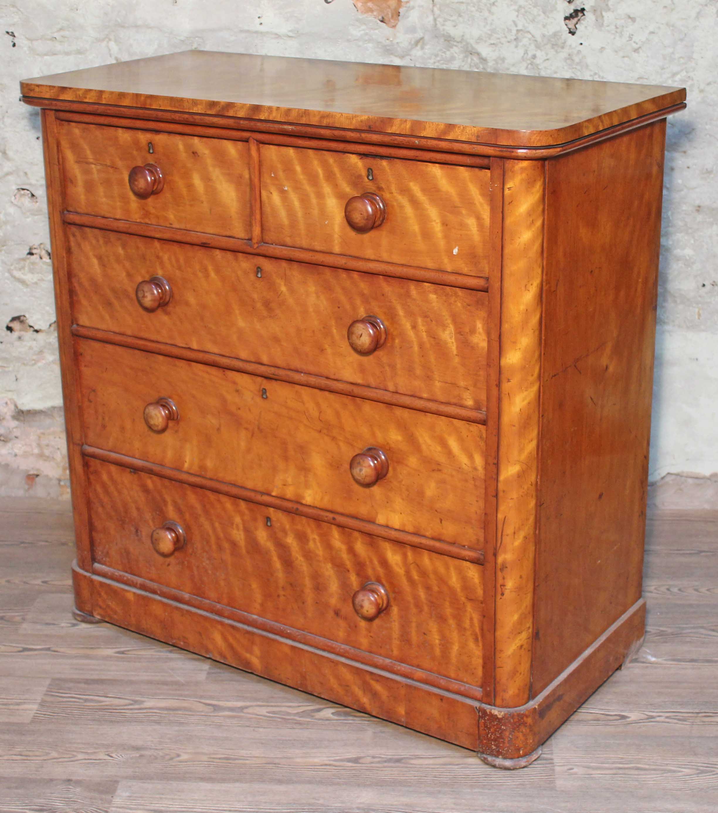 A Victorian satin birch chest of drawers, width 107cm, depth 52cm & height 106.5cm.