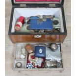 A Victorian box and contents including a hallmarked silver pepper pot, various coins etc.