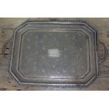 An Eastern white metal tray marked 'Silver', wt. 24oz, length 39.5cm.