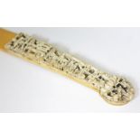 A Chinese Canton ivory and carved bone page turner circa 1900, length 37.5cm. Condition - minor