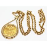 An Elizabeth II 1974 sovereign with chain 9ct gold chain, gross wt. 13.6g.