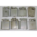 A group of eight vintage lighters.