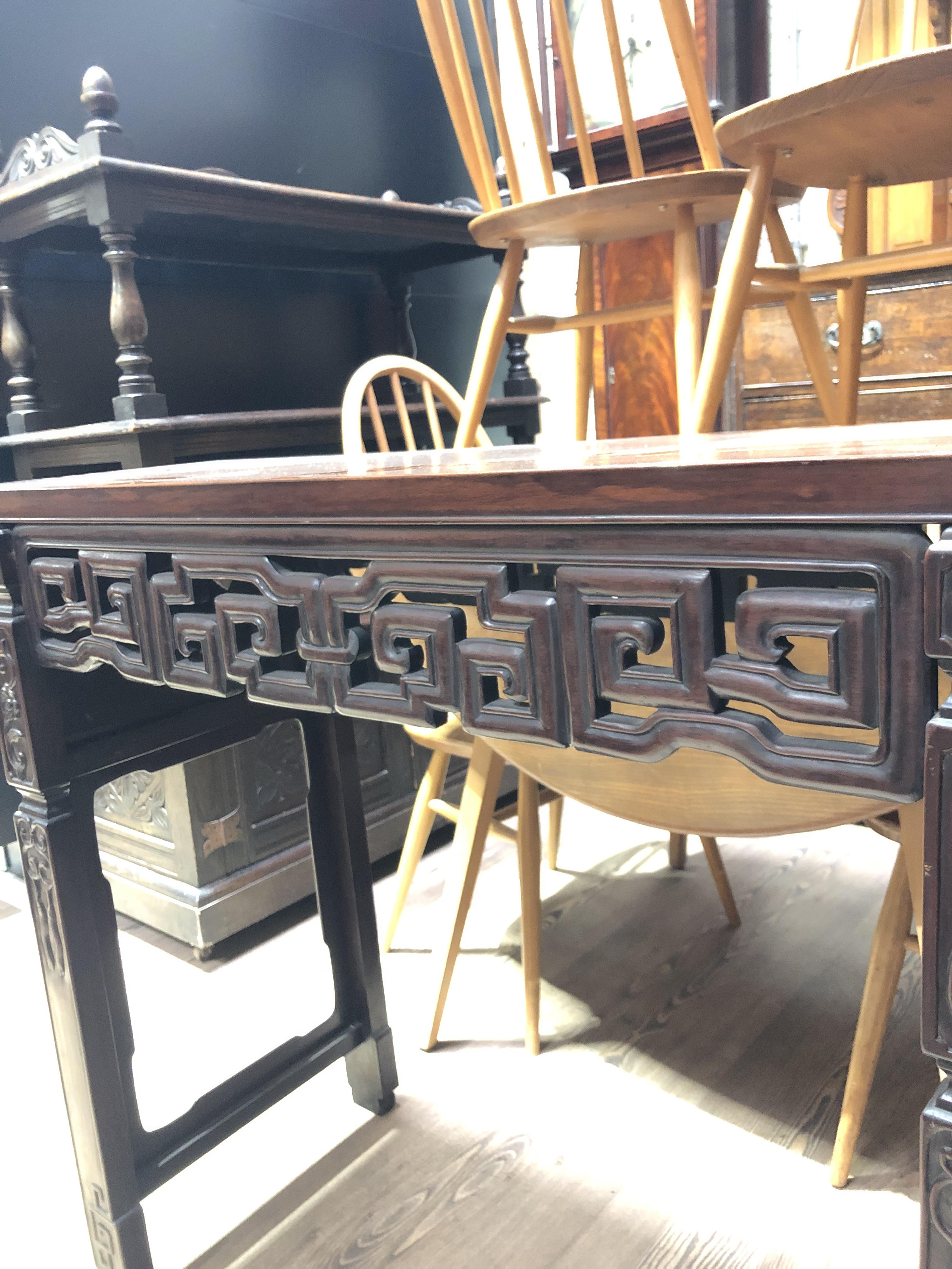 A Chinese altar table, late 19th century, carved frieze with scroll ends and carved square legs, - Image 9 of 12