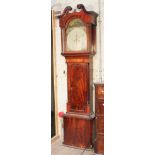 A Georgian mahogany long case clock circa 1800 with broken swan neck pediment, arched hood with