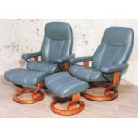 A pair of Norwegian Ekornes Stressless Consul leather and bent wood reclining armchairs with