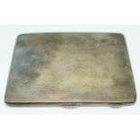 A hallmarked silver cigarette case, 11cm x 8cm, wt. 4oz.