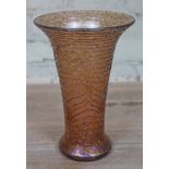 A Loetz style iridescent tubed lined glass vase with flared rim, ground pontil, height 24.5cm.