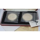 A cased set of two Sudan silver proof coins, Royal Mint, boxed with certificates.