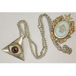 A hallmarked silver Masonic jewel and a silver all seeing eye pendant marked '925' with import