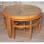 A Nathan teak nest of tables with glass top, diam. 84cm & height 51cm. Condition - good, general