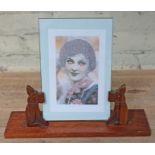 An Art Deco style scot dog photo frame, height 29cm. Condition - general wear to include minor chips