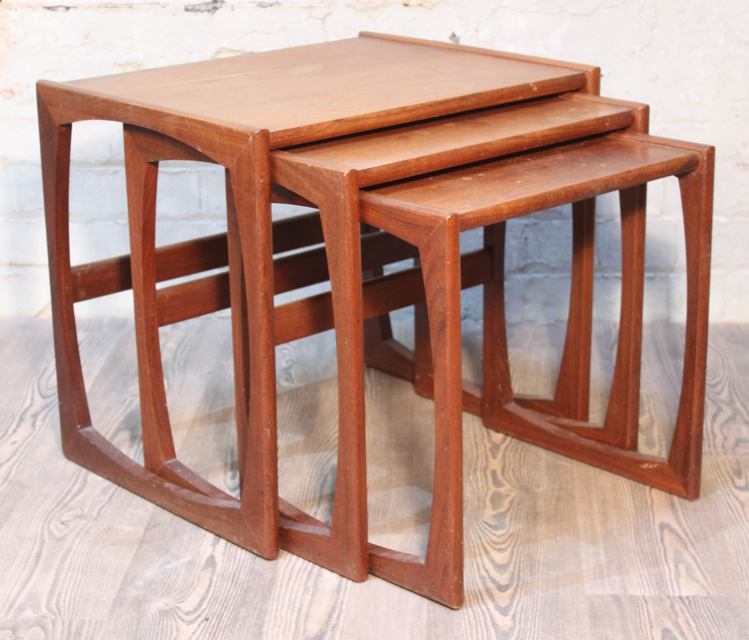 A G-Plan teak nest of tables.