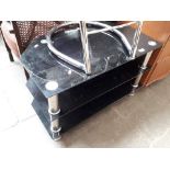 A black glass tv stand