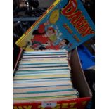A box of annuals, Dandy and Beano