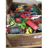 A box of die- cast vehicles