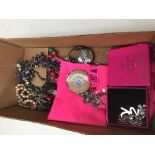 A box of named costume jewellery