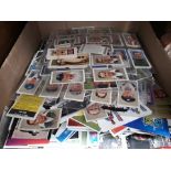 A box of cigarette cards & trade cards