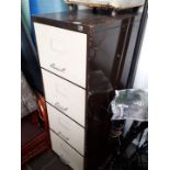 A 4 drawer metal filing cabinet