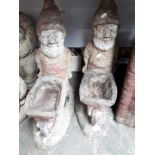 Garden ornaments, two gnomes with wheelbarrows