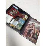 A box of religious items including crucifixes, badges, rosary beads, to include MOP, etc