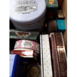 A box of vintage tins