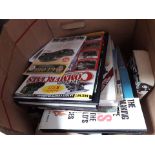 A box of books, some transport related